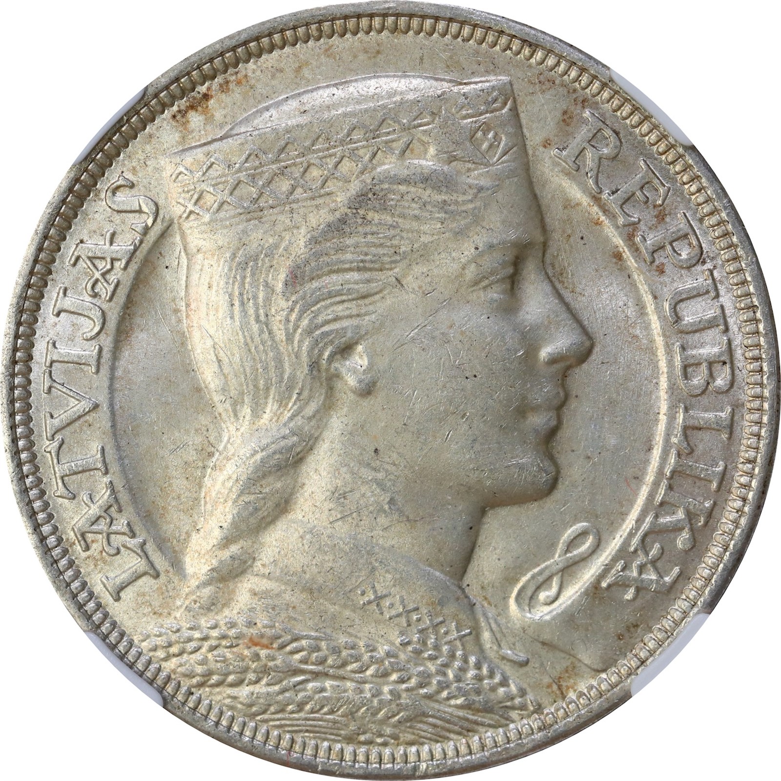 LATVIA. 5 Lati 1931 NGC MS61